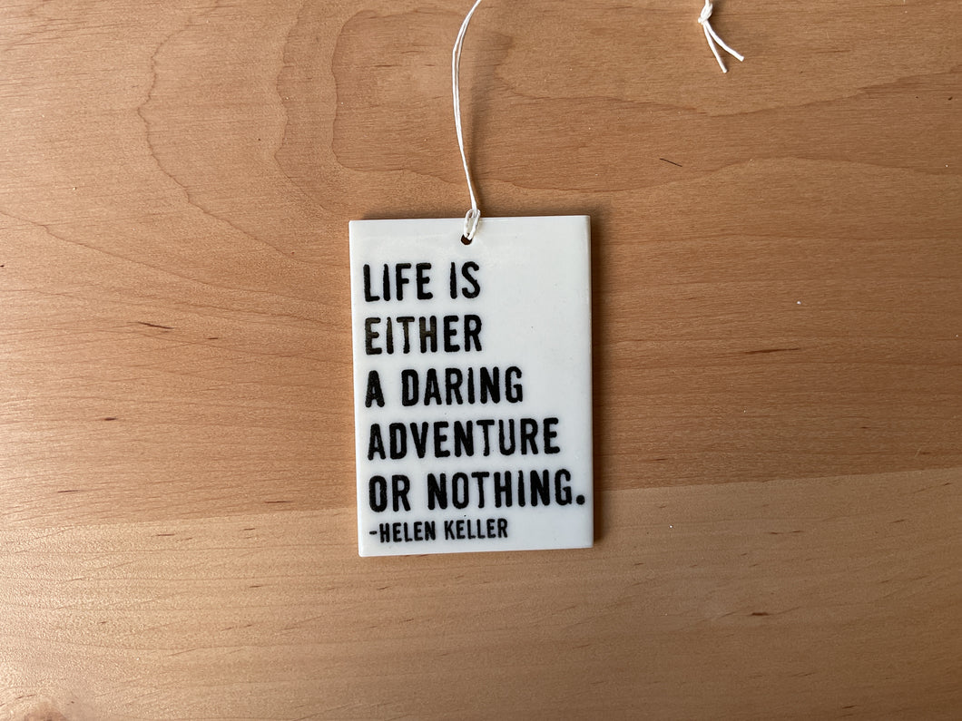 Life is either daring adventure