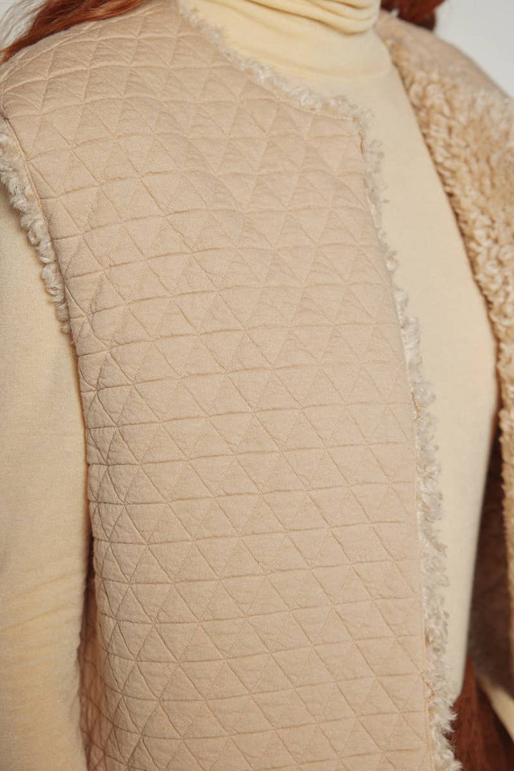 Reversible fur short vest