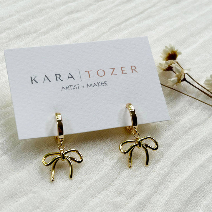 Gold Bow Charm Hoops KT797