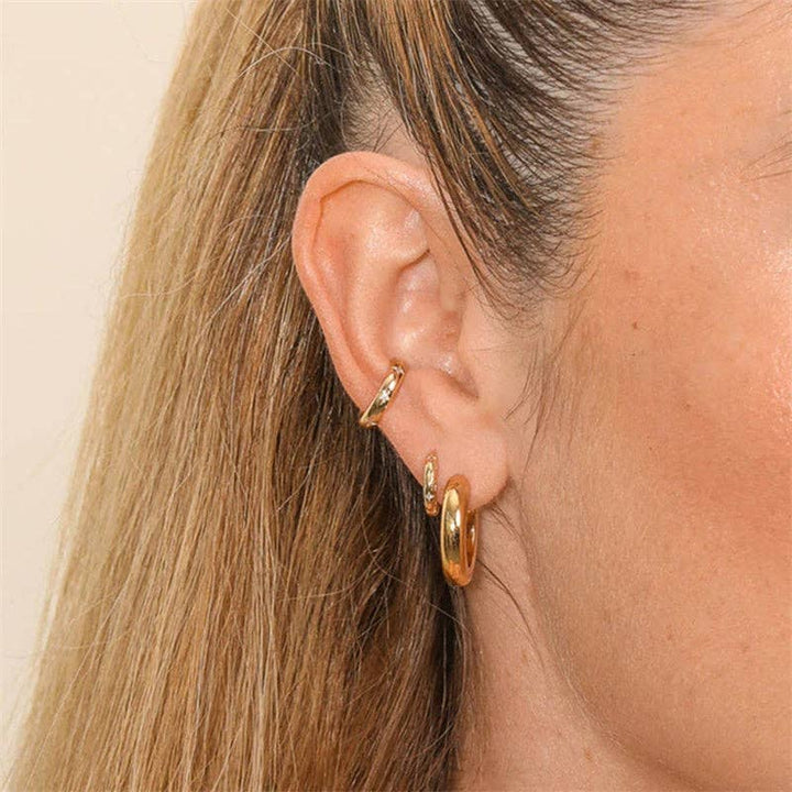 Dainty Gold Star Huggie Hoop Earrings in 925 Sterling Silver